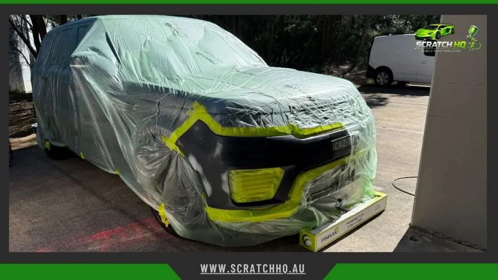 Ford Ranger fully masked with plastic and tape for mobile car scratch repair