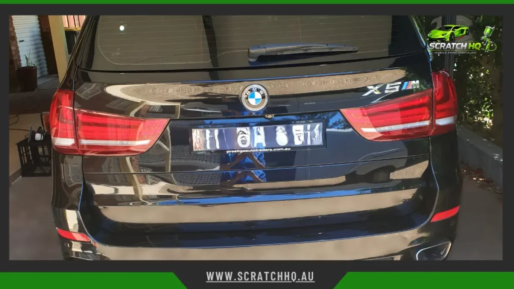 black bmw x5 with ceramic coating providing durable paint protection and a sleek, high-gloss finish from every angle