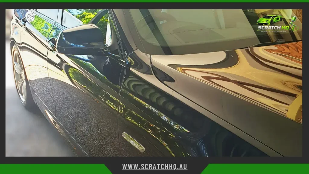ceramic coated black bmw sedan featuring a high-gloss finish with enhanced protection against the elements